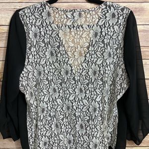 Black sheer with white lace back.